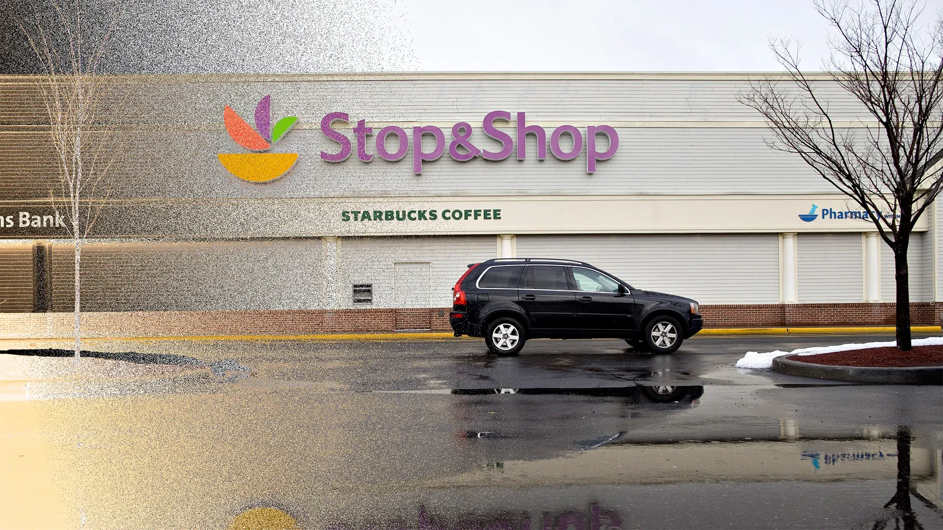 Exterior of a Stop & Shop supermarket with storefront signage in daylight