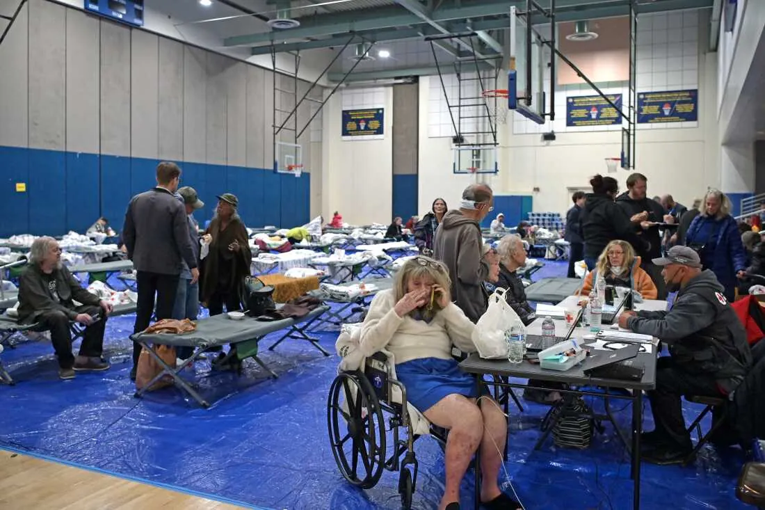 Older adult evacuees from the January 2025 Los Angeles wildfires gathered at an evacuation shelter