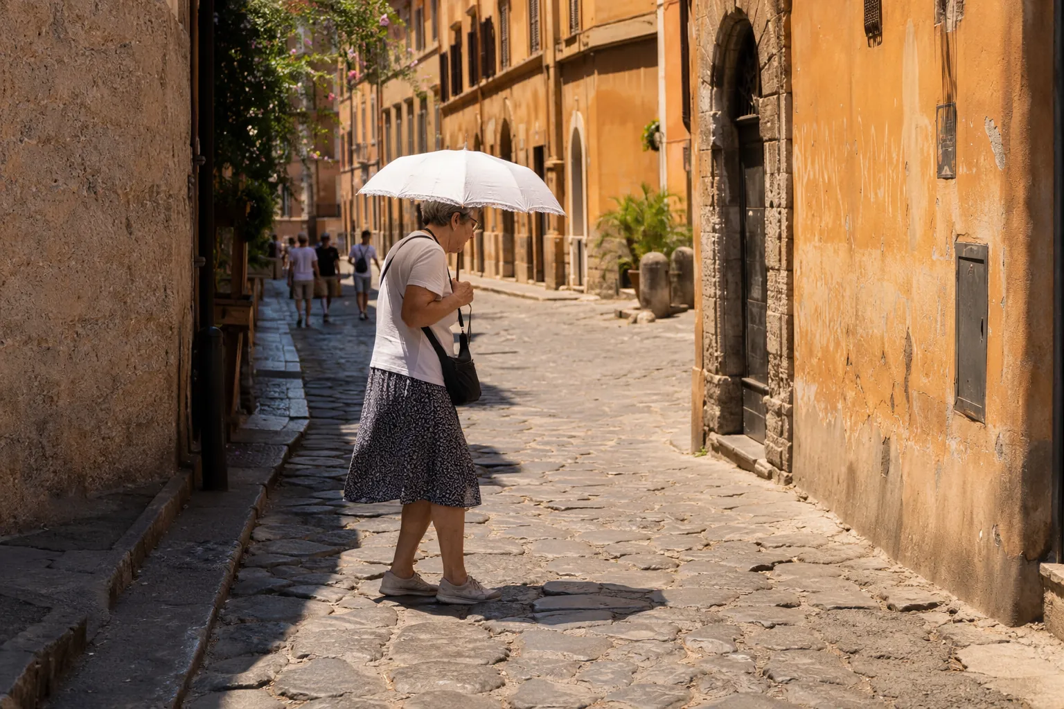 Senior woman walking carefully across hot cobblestones in a historic European city