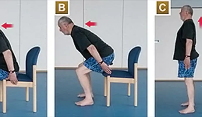 Older adult demonstrating a sit-to-stand exercise